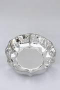 silver bowl with wavy edges