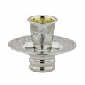 Silver kiddush cup mayim achronim with ornate design on a white background