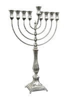 Silver Menorah with eight candles on a white background