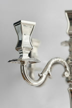 hadad bros Silver candelabra on a white background