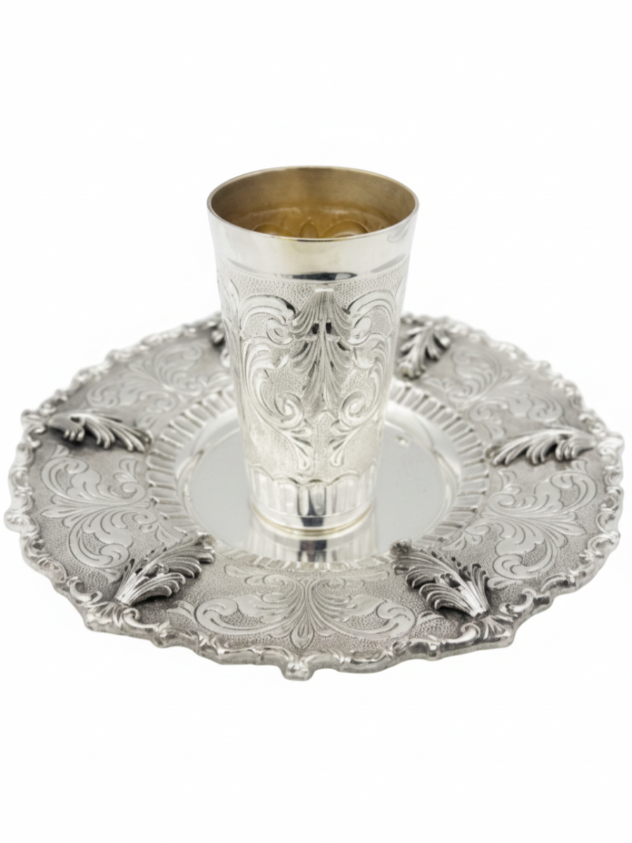 Silver kiddush cup and tray on a white background