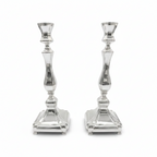 Two sterling silver 925 candle holders on a white background