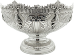 Decorative silver bowl with intricate engravings on a white background