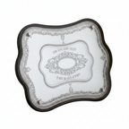 Two decorative challah bread trays with intricate designs on a white background